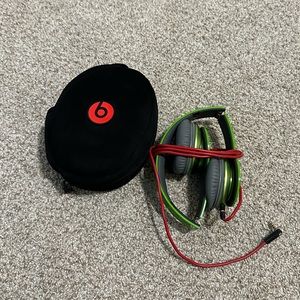 green Beats by Dre headphones with aux